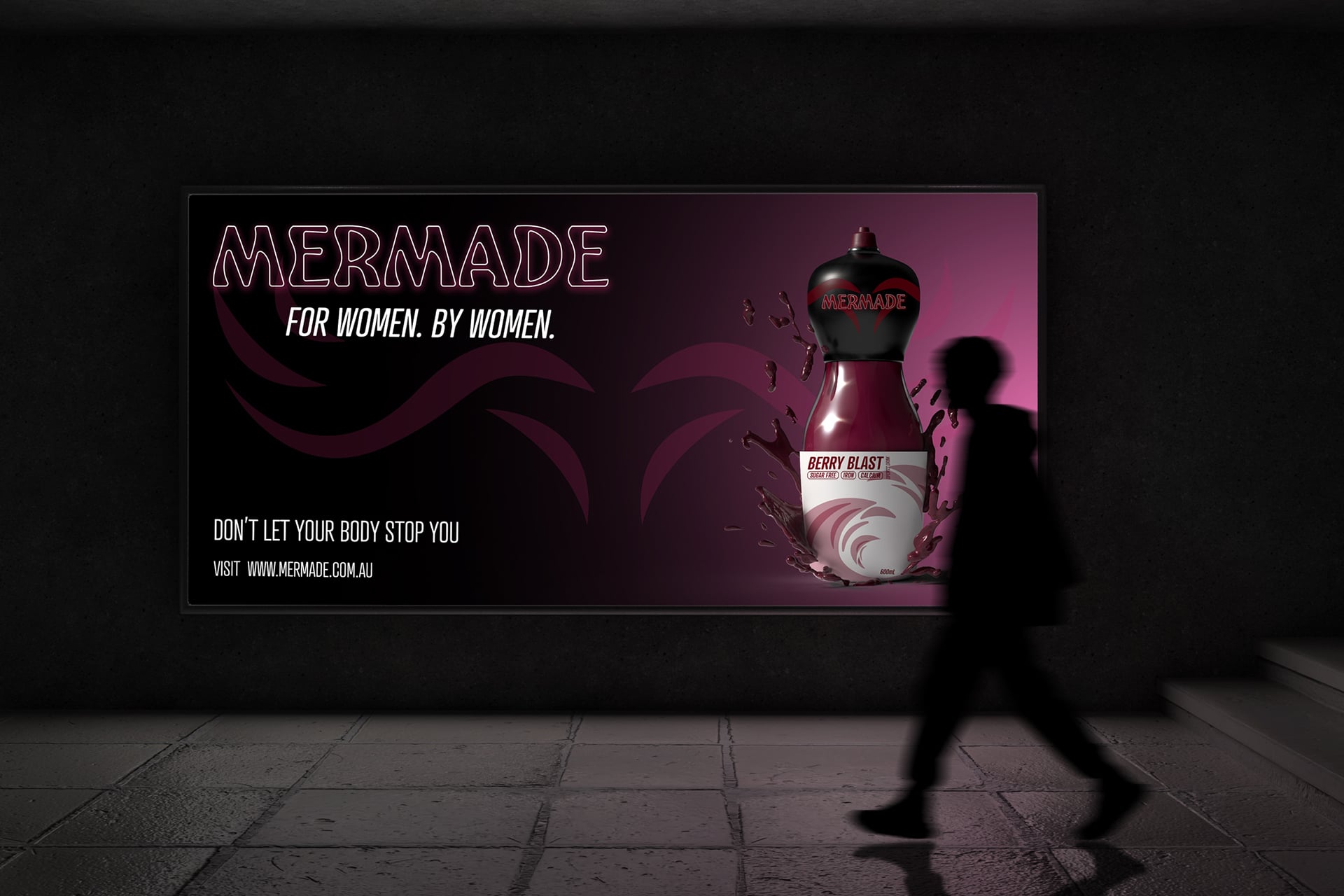 Mermade billboard mockup showing outdoor advertising design in a nighttime setting with a person walking past