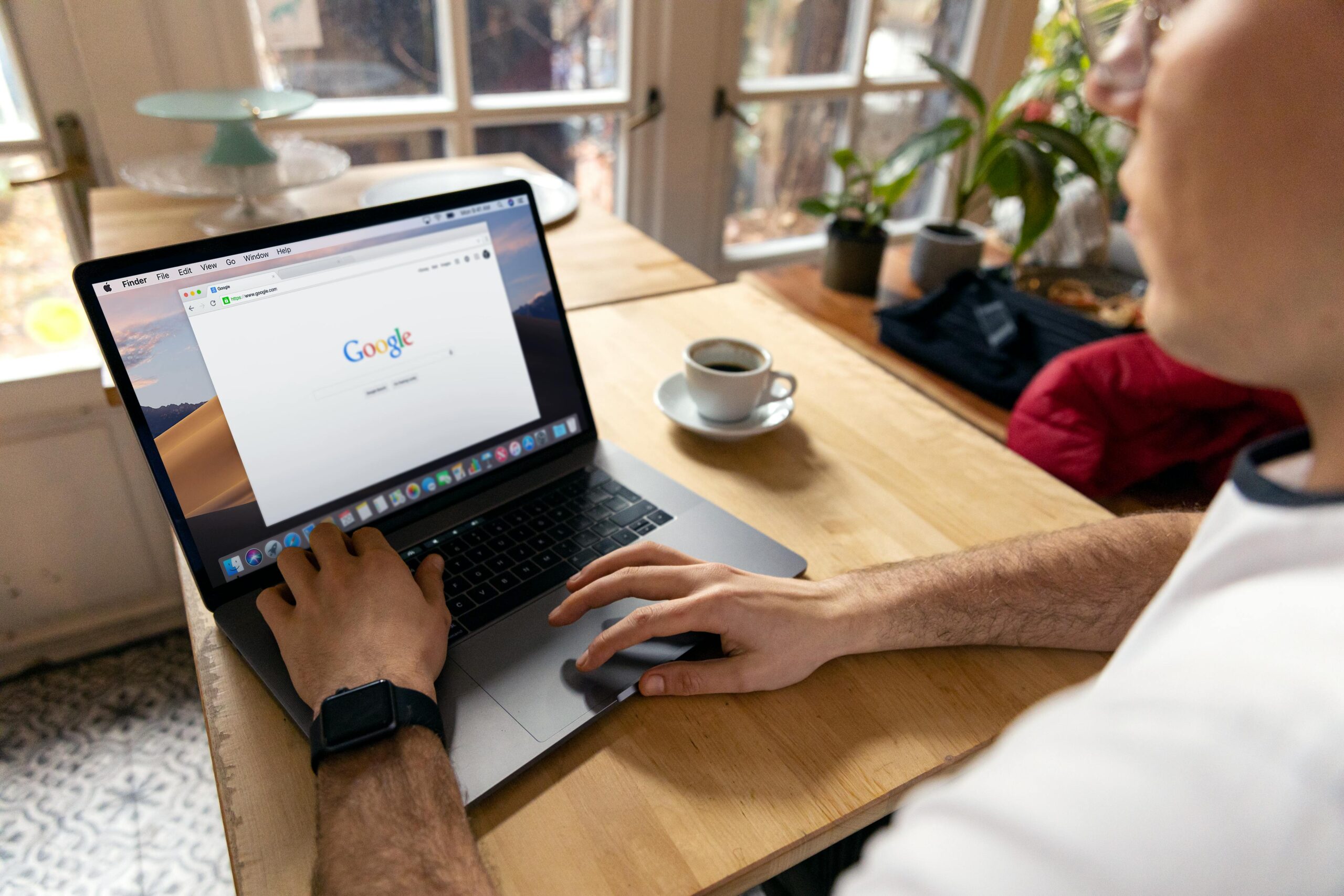 Person viewing a business website on a laptop